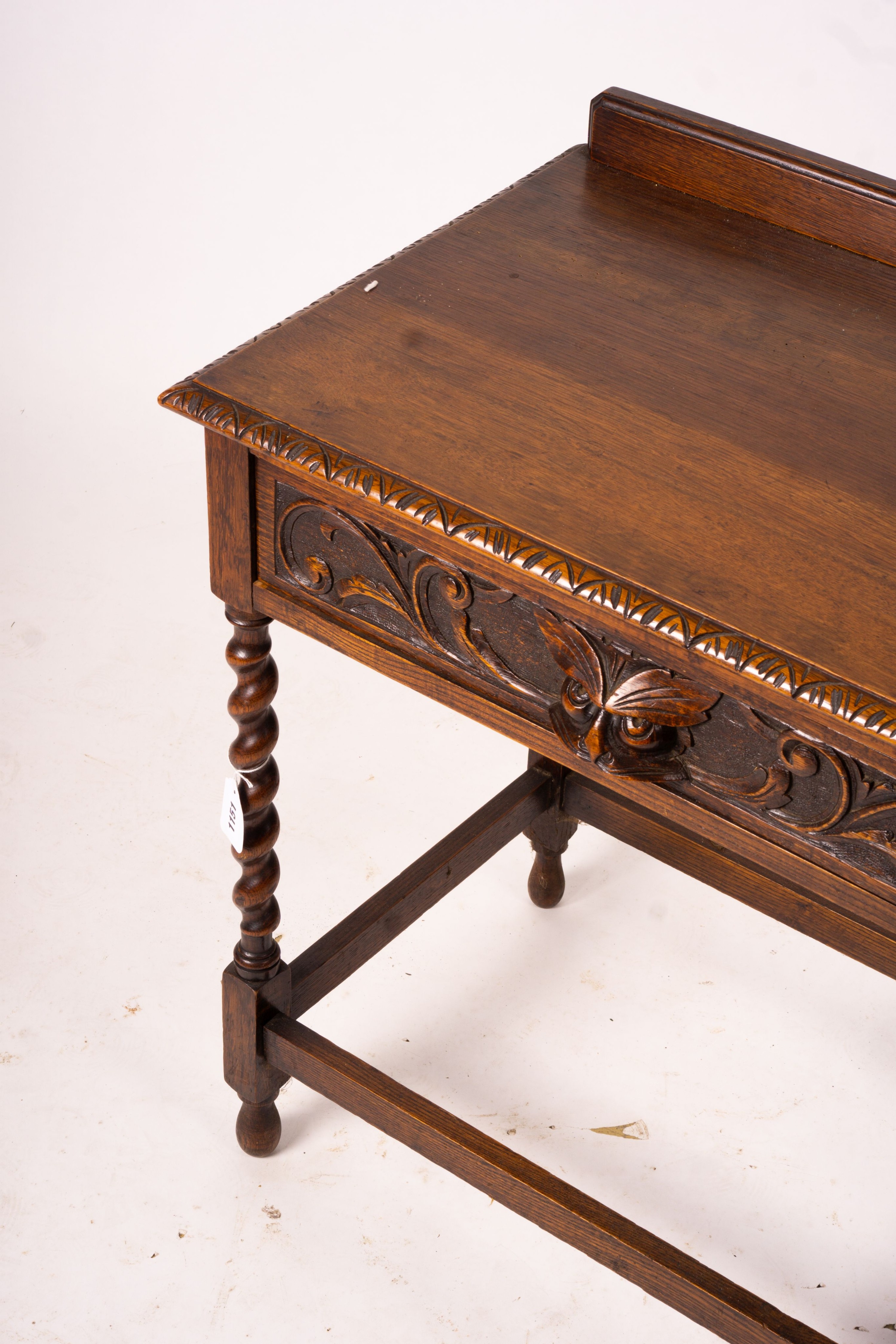 An early 20th century Flemish carved oak side table, W.69cm D.46cm H.77cm